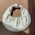 Pearl-Encrusted Silk Potli Bag gallery image thumbnail #1